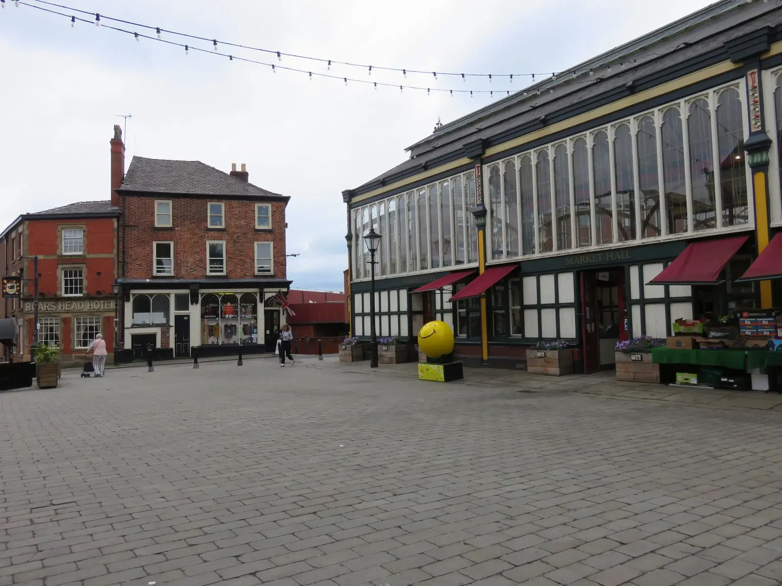 Stockport Market Hall and surrounding buildings on Market Place.