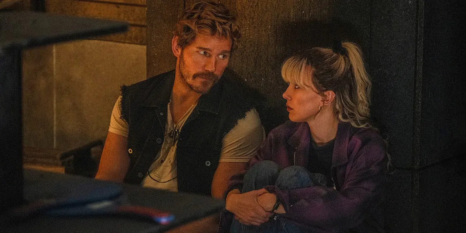 Why did Cosmo revive in a junkyard instead of Blue Sky Acres, and what does this mean for Christopher in The Electric State?
