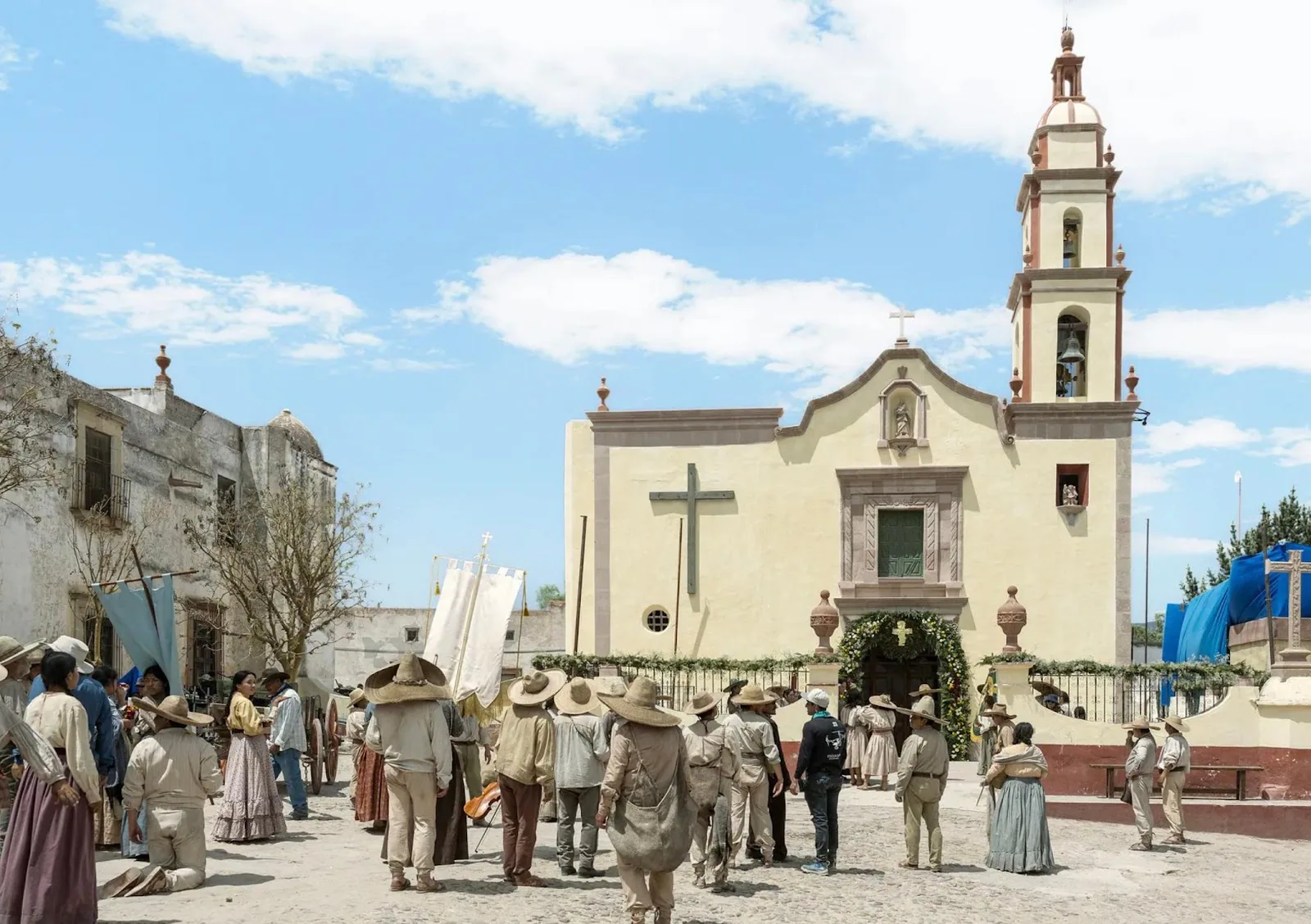 A solitary figure walks through the desolate landscape of Comala in Pedro Páramo (2024)