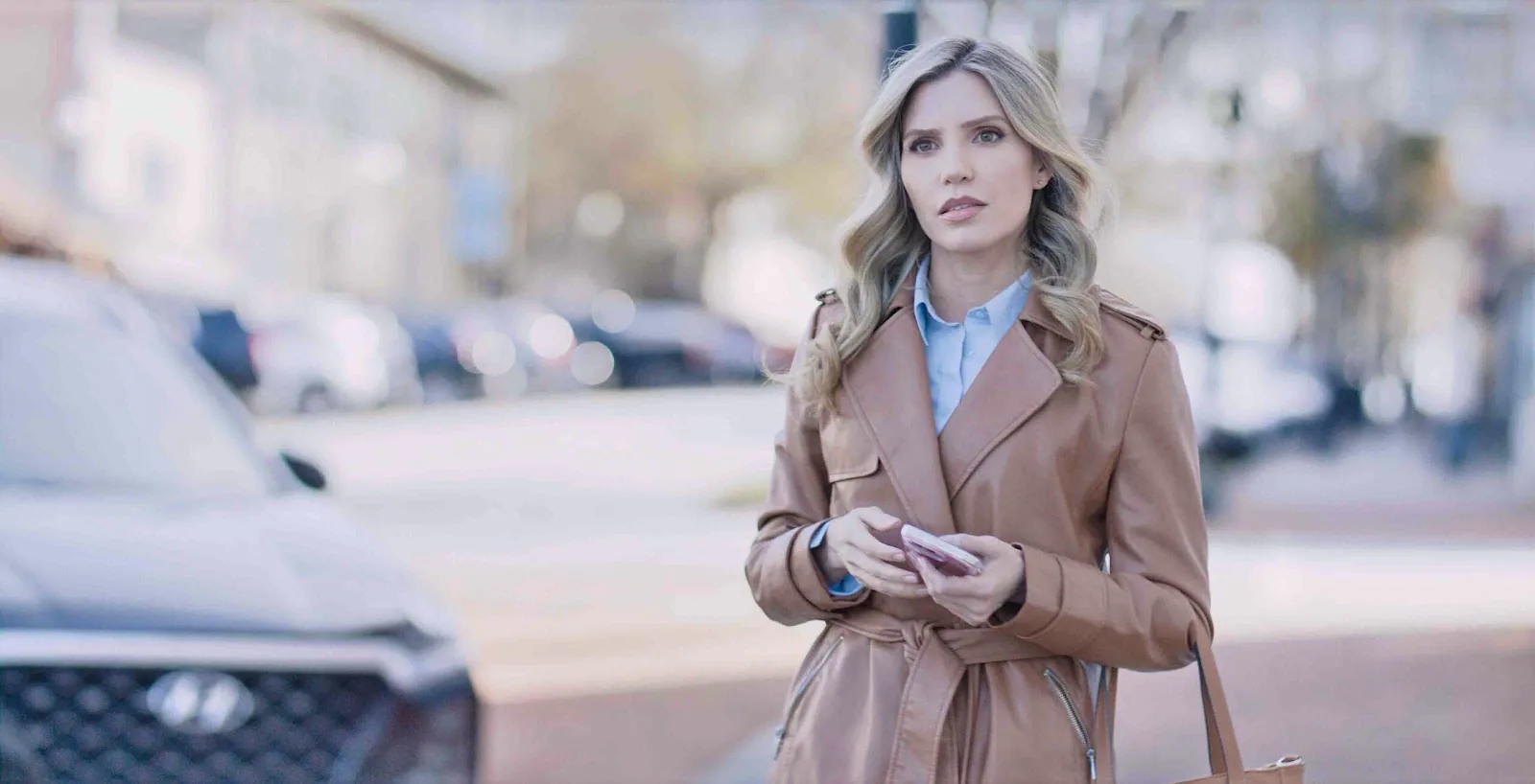 Promotional still from Who's Stalking My Family showing a character in a suburban setting