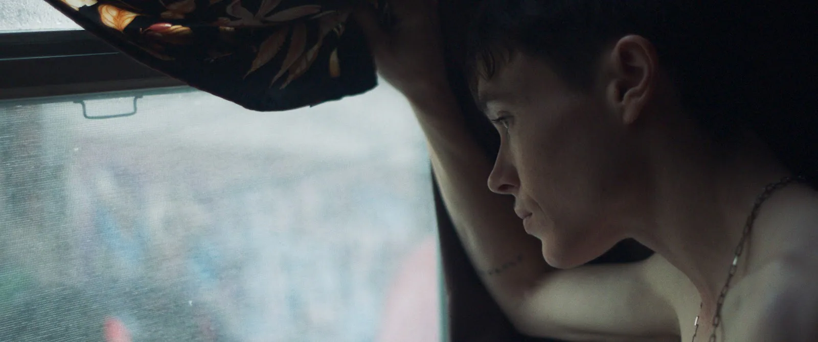 Elliot Page as Sam, a trans man returning home for a family visit, in the 2024 film Close to You