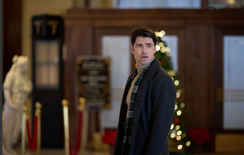 Still from The Christmas Charade (2024) featuring the cast